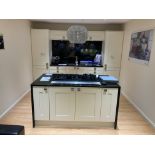 Cream kitchen display with island and appliances