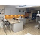 Cashmere and oak kitchen display with appliances