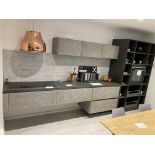 Concrete and graphite open section kitchen display with appliances