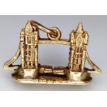 A 9K GOLD CHARM OF TOWER BRIDGE WITH MOVING PARTS (BRIDGE OPENS) 3.2gms