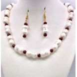 A rare and very collectable necklace and matching earrings set with totally natural, large (up to 20