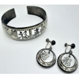 A rare, vintage, sterling silver bangle and matching earrings set with Chinese characters. Total