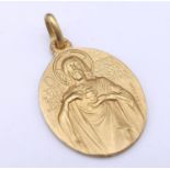 18k yellow gold double sided religious medallion (2.2cm x 1.8cm) weight 6g