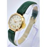 A Vintage Omer 9K Gold Cased Ladies Watch. New green leather strap. 9K gold case - 21mm. White