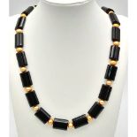 A Sophisticated Looking Cultured Golden Pearl and Black Elongated Acrylic Bead Necklace. 50cm