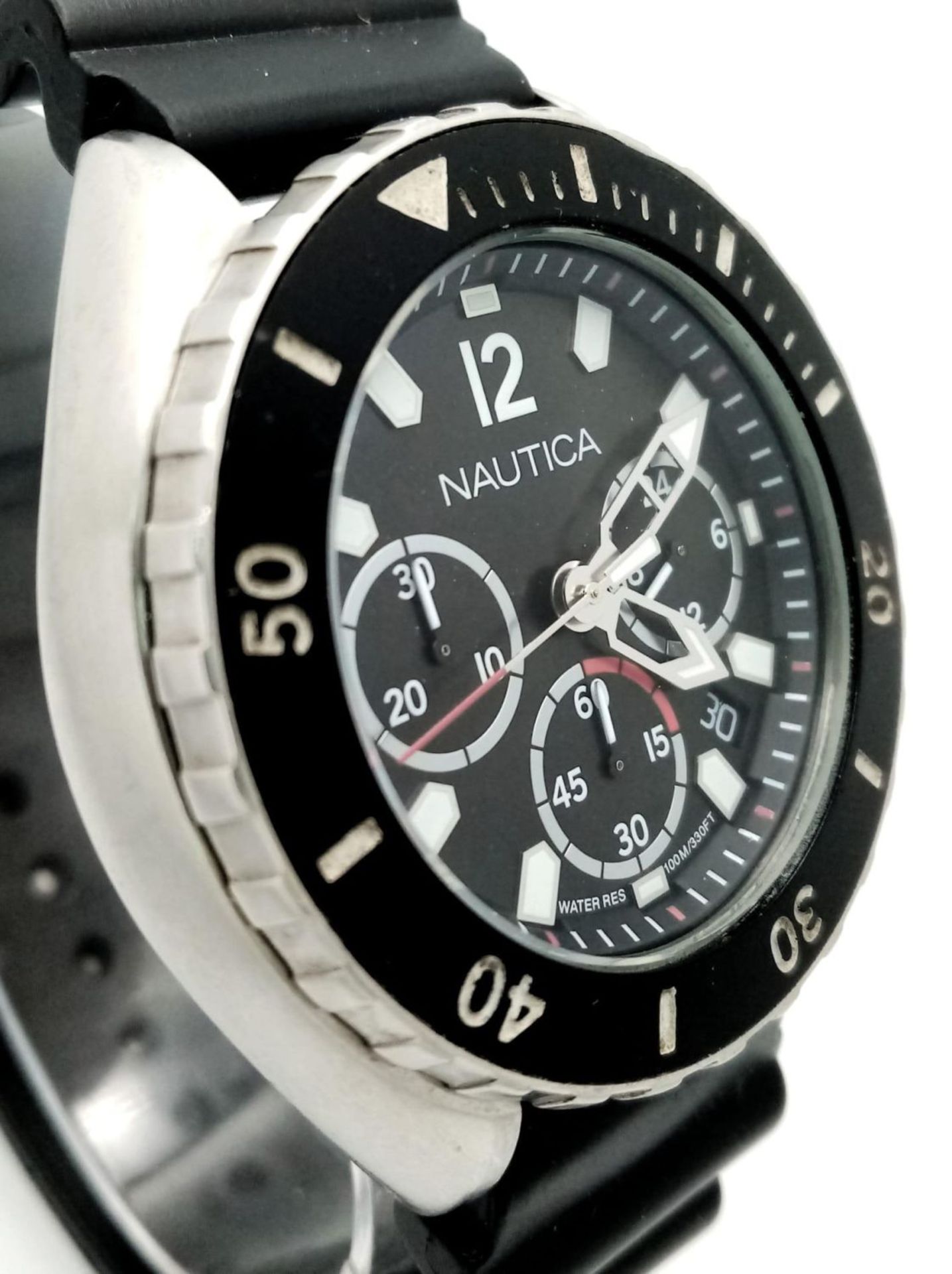 A Nautica Chronograph Quartz Gents Watch. Black rubber strap . Stainless steel case - 46mm. Black - Bild 4 aus 5