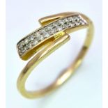 18K Yellow Gold Diamond Crossover Ring. 2.2g total weight. Size M1/2. (dia 0.11ct). Ref: SH2696H