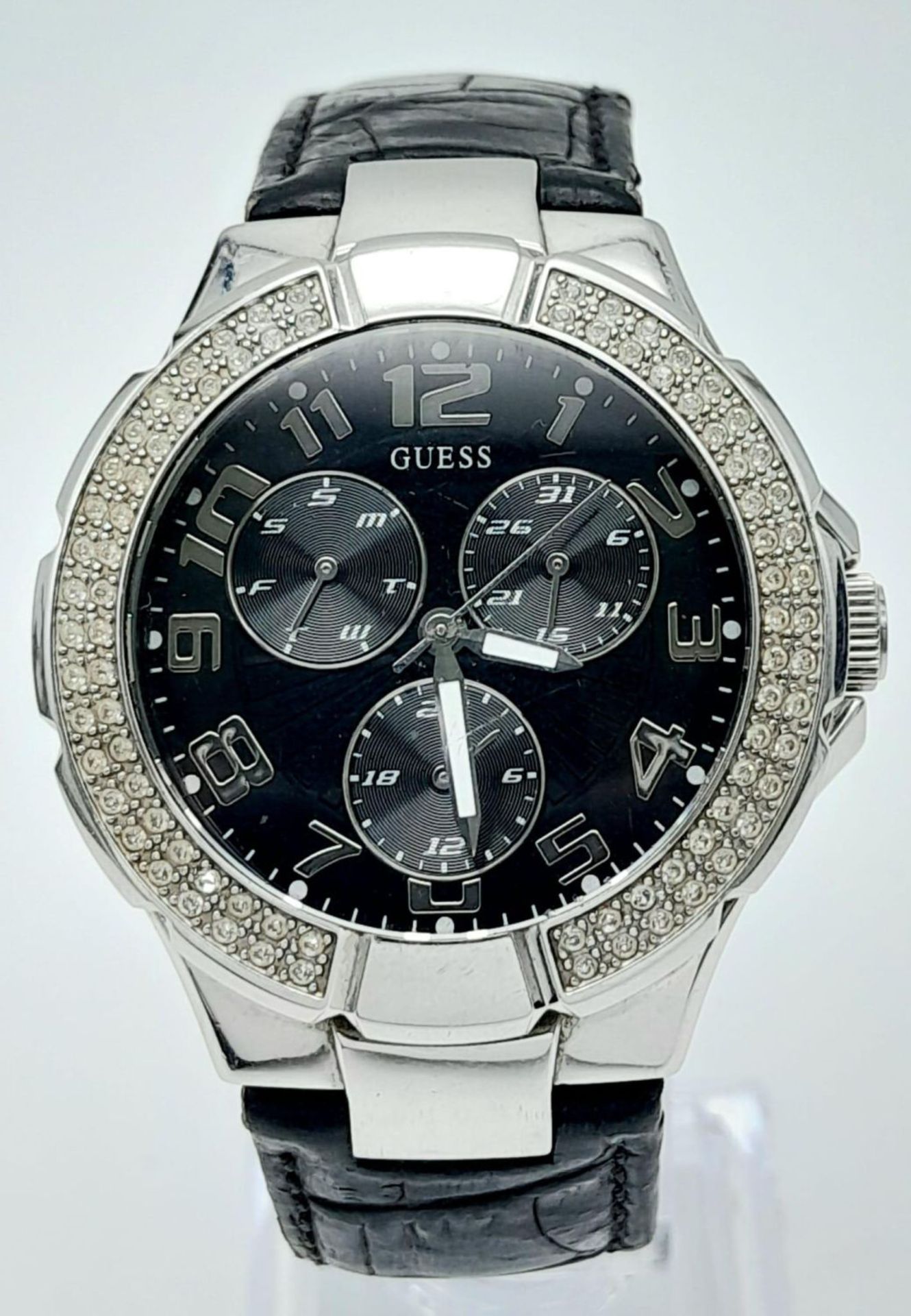 A Unisex Clear Stone Set Bezel Watch by Guess. 42mm Including Crown. Full Working Order. In