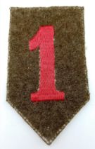 A WW1 US 1st Infantry Patch “The Big Red 1”.