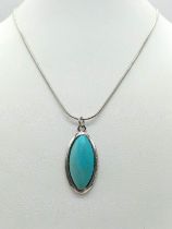 A Vintage Sterling Silver Oval Cut Turquoise Pendant Necklace. 49cm Length Sterling Silver Rope