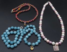 A trio of colourful 925 Silver Necklaces. 1) Blue beaded necklace, 925 clasp, amber stone pendant (