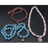A trio of colourful 925 Silver Necklaces. 1) Blue beaded necklace, 925 clasp, amber stone pendant (