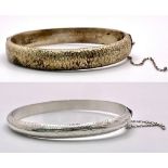 2X vintage sterling silver click-on bangles. One come with full Birmingham hallmarks. Total weight