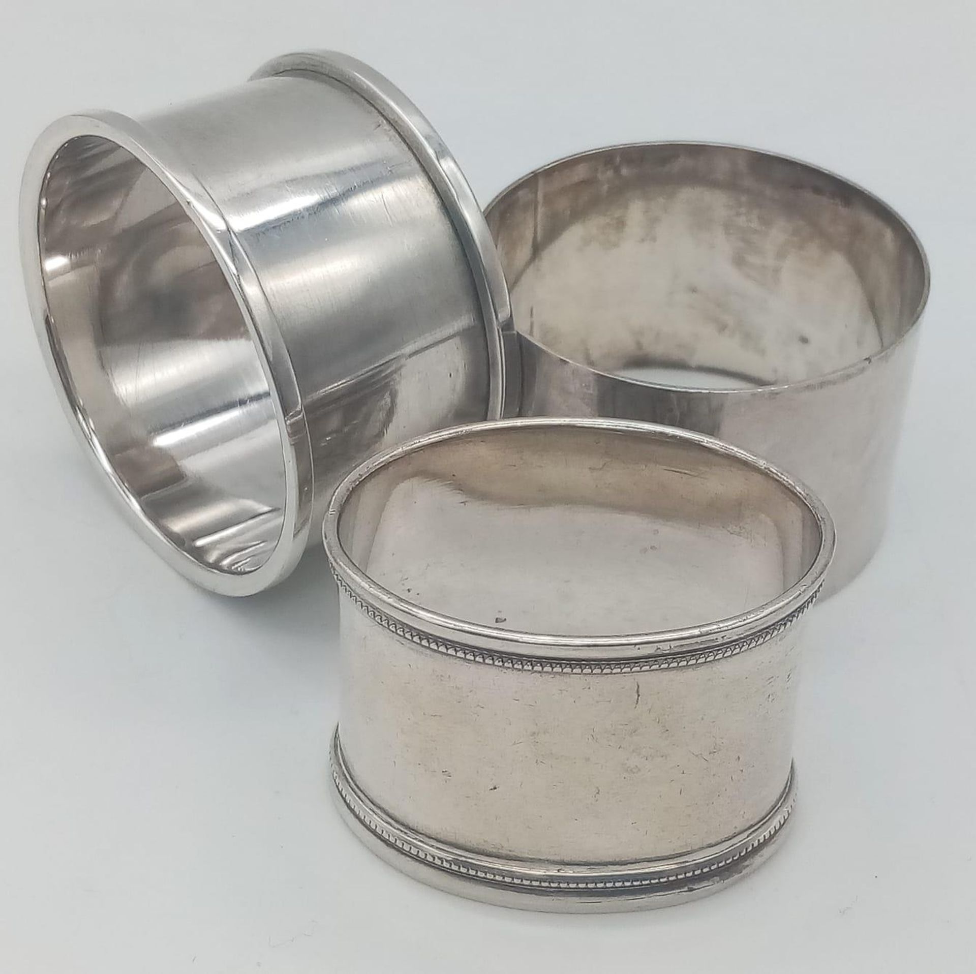 A collection of 3 vintage sterling silver napkin holders include 2X circular with full Birmingham - Image 2 of 5