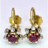 A 14K YELLOW GOLD VINTAGE DIAMOND & RUBY SCREW BACK CLIP ON EARRINGS, IN THE FLORAL DESIGN 2.9G ref: