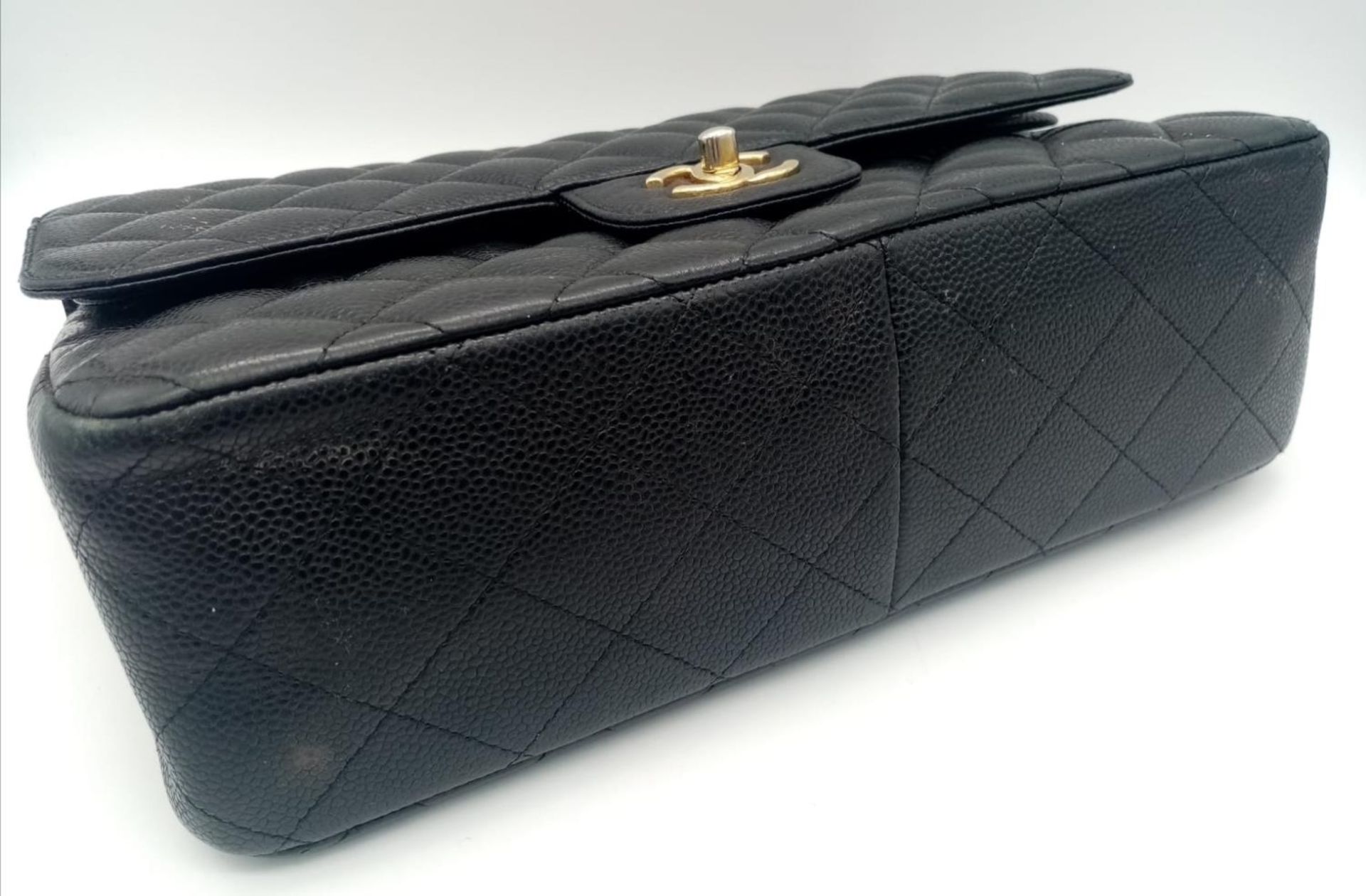 A Chanel Black Caviar Classic Double Flap Bag. Quilted pebbled leather exterior with gold-toned - Image 5 of 11