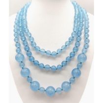 A Rope Length Graduated Blue Jade Bead Necklace. Perfect for different wearing arrangements. 138cm