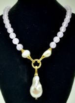 A Lavender Jade Bead Necklace with a Large Keshi Baroque Pearl Pendant (detachable) and Pearl