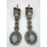 A Beautiful Pair of Opal and Diamond Drop Earrings set in 925 Silver. Diamond weight approx 2ctw.