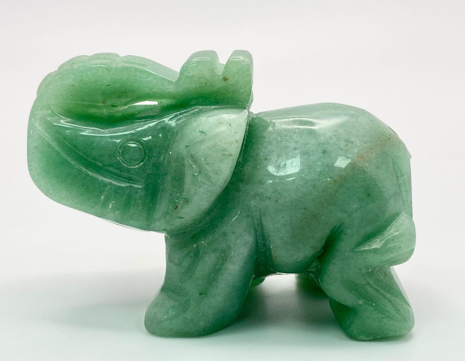 A Hand-Carved Green Jade Elephant Figure. 5.5 x 4cm