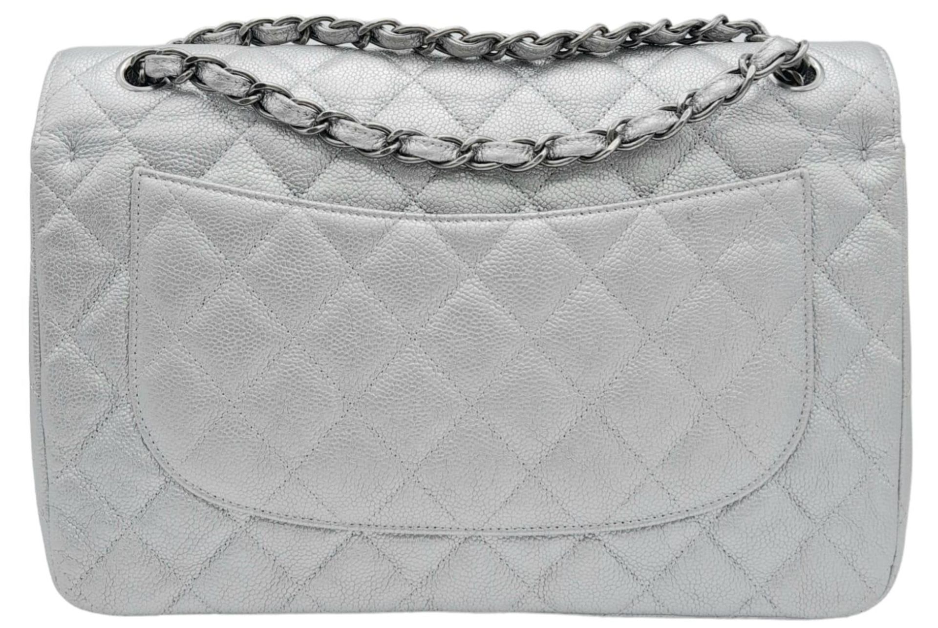 A Chanel Metallic Silver Double Flap Jumbo Bag. Quilted caviar leather. Silver tone hardware. Double - Image 5 of 12