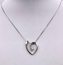 A 18K WHITE GOLD DIAMOND SET HEART ON CHAIN NECKLACE 0.15CT approx 5.5G , 44cm length , 2cm x 1.