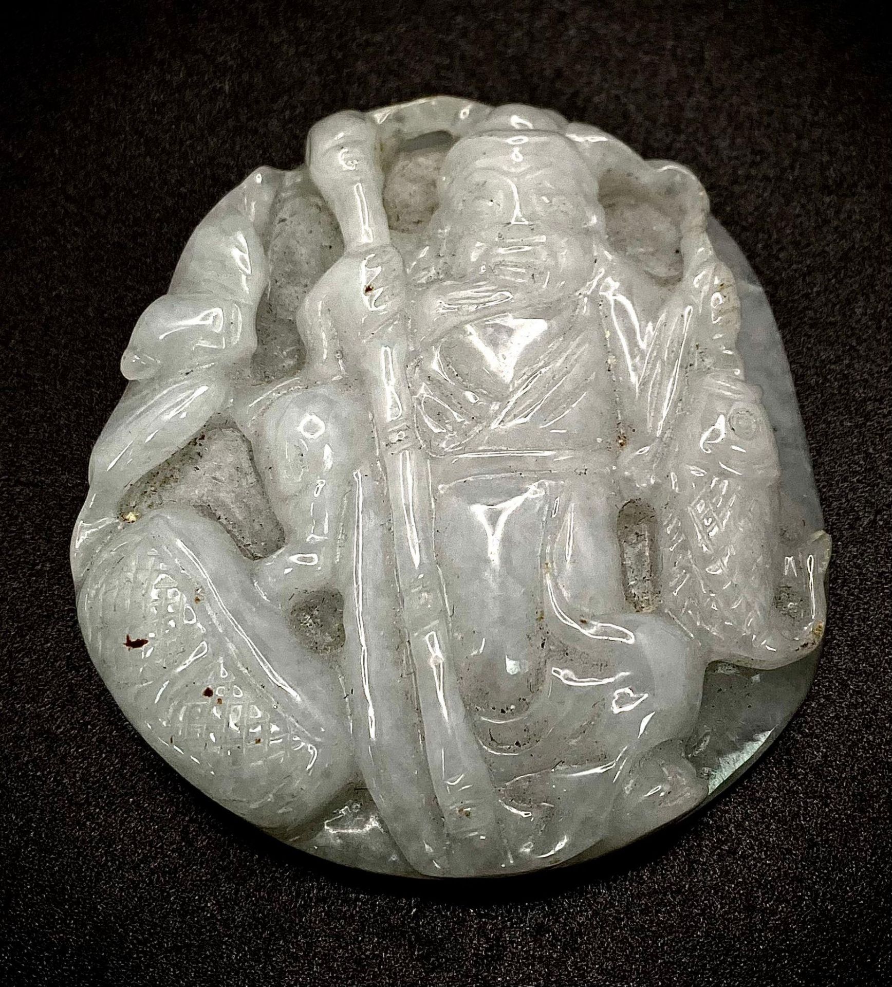 An Antique Chinese White (translucent) Jade Pendant. Hand-carved image of an elder fisherman. 5.