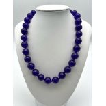 A Hypnotic Deep Purple Large Jade Beaded Necklace. 42cm necklace length. 12mm beads.