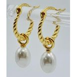 Pair of Yellow Gold Gilded, Sterling Silver Hooped Pearl Earrings. Measures 1cm in length. Weight: