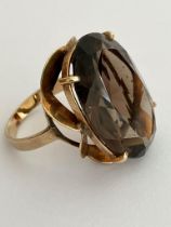 Impressive 9 carat yellow GOLD RING Set with an extremely large oval cut smoky quartz gemstone.