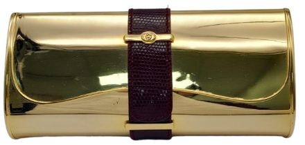 A Fabulous Gucci Gold Tone Metal and Lizard Trim Clutch Bag. Soft textile interior with mirror. In