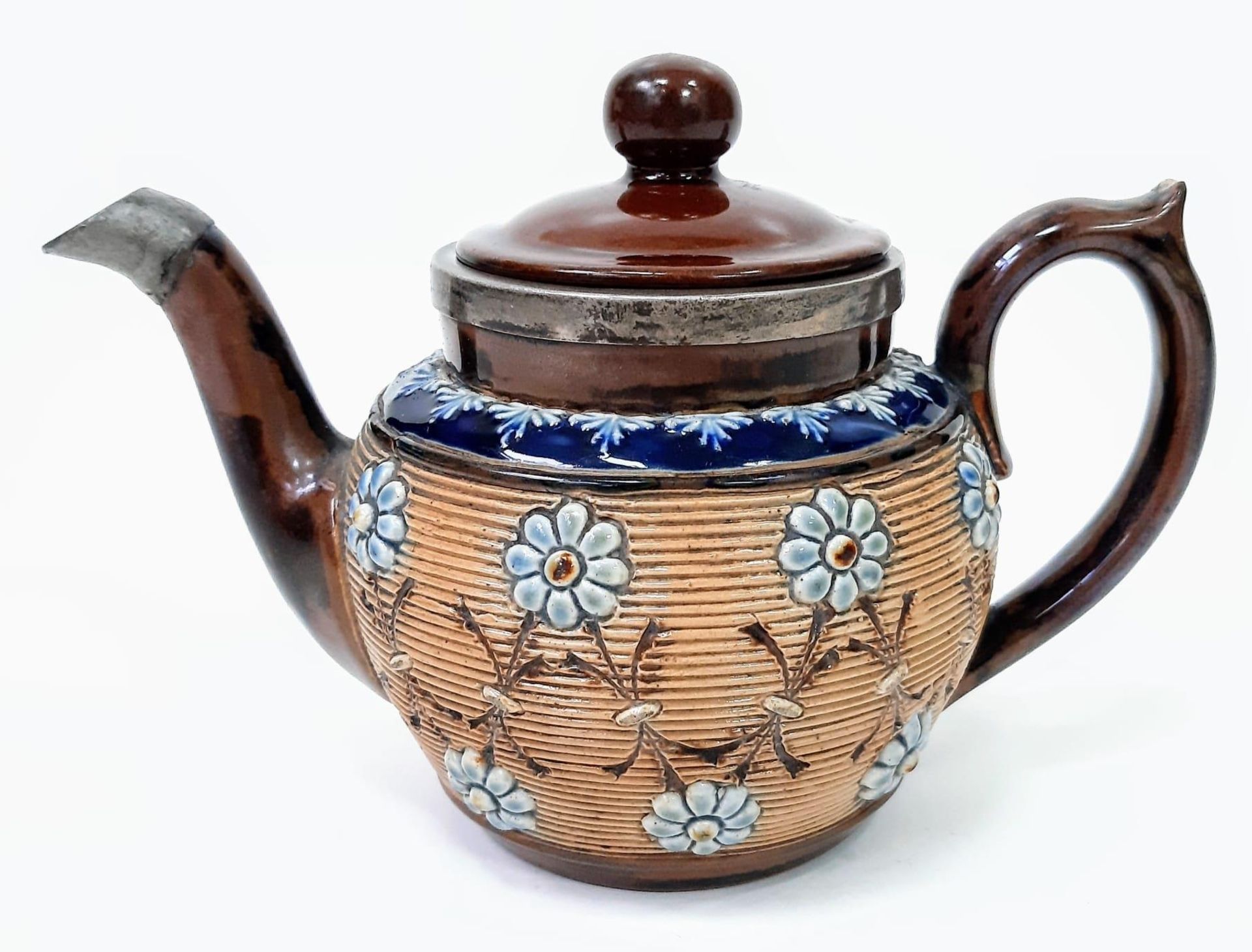 An Antique (1890s) Doulton Lambeth Silver Trimmed Teapot. 20cm across. 14cm tall. Decorative - Image 3 of 8