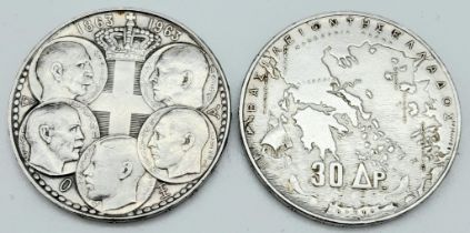 A pair of silver Greek coins (30 drachmae) commemorating the centenary of the Democratic Kingdom