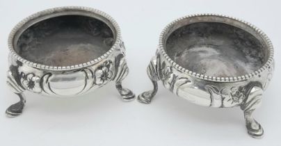 A collection of two antique Salt Cellars. Both London Silver, dated 1865 and made by Robert Harper