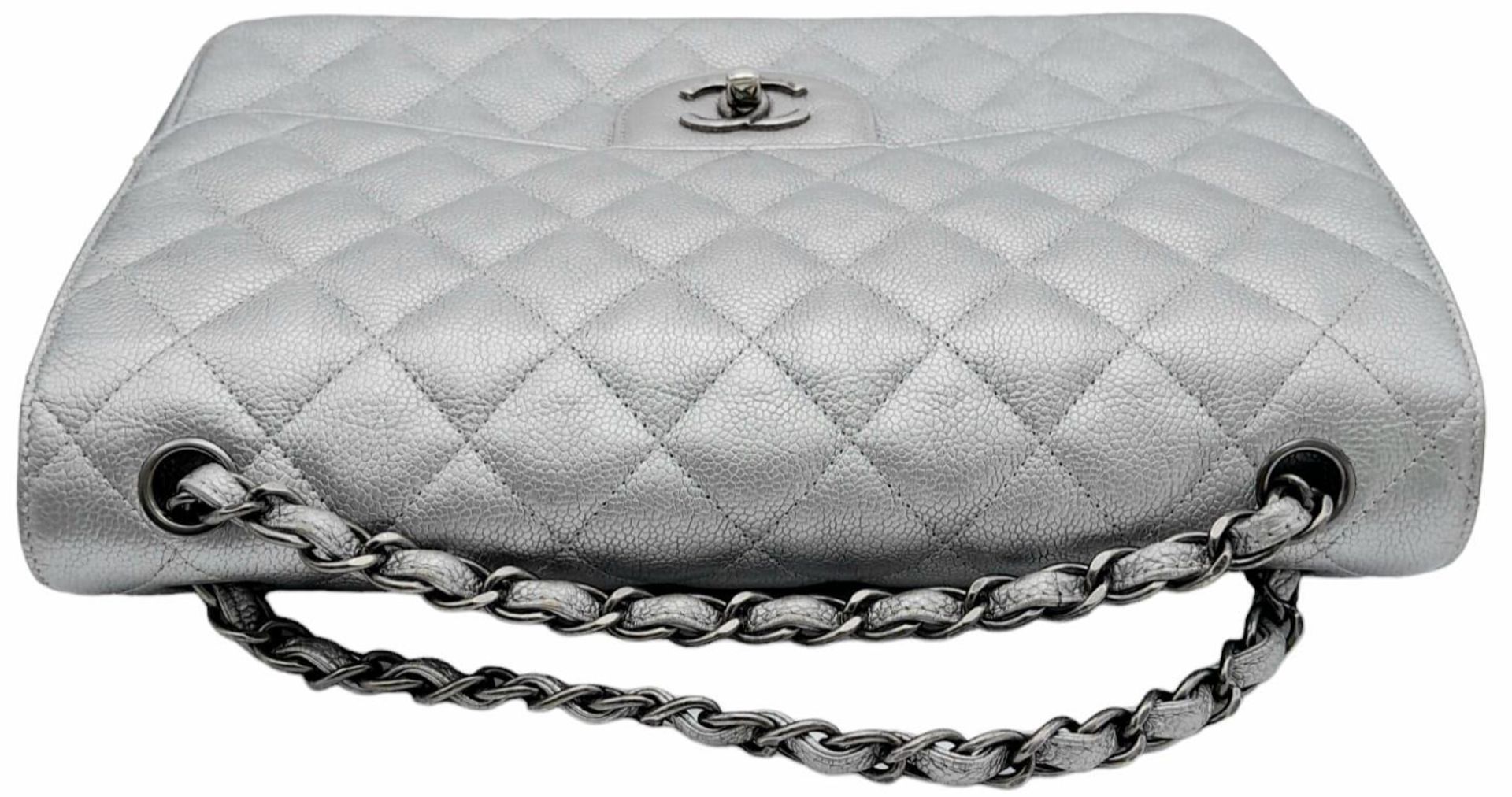 A Chanel Metallic Silver Double Flap Jumbo Bag. Quilted caviar leather. Silver tone hardware. Double - Image 6 of 12