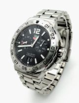 A Tag Heuer Formula 1 Gents Alarm Watch. Stainless steel bracelet and case - 42mm. Black dial with