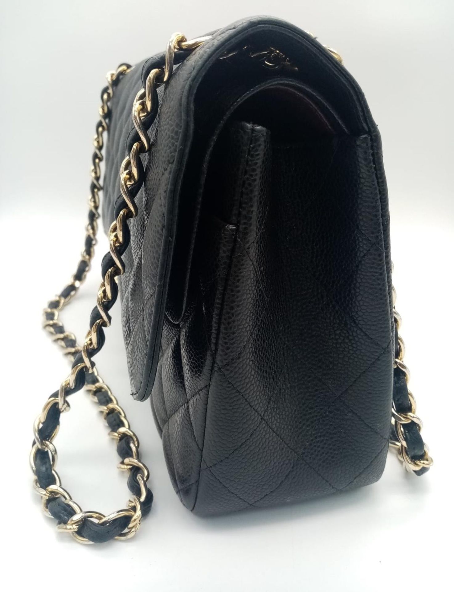 A Chanel Black Caviar Classic Double Flap Bag. Quilted pebbled leather exterior with gold-toned - Image 4 of 11