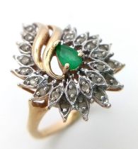 A 14K YELLOW GOLD FANCY DIAMOND & EMERALD CLUSTER RING, IN THE FLORAL DESIGN 4.2G SIZE J 1/2 ref: SC