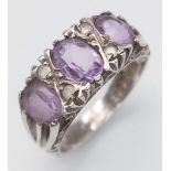 A Vintage Sterling Silver Three Stone Amethyst Ring. Size L.