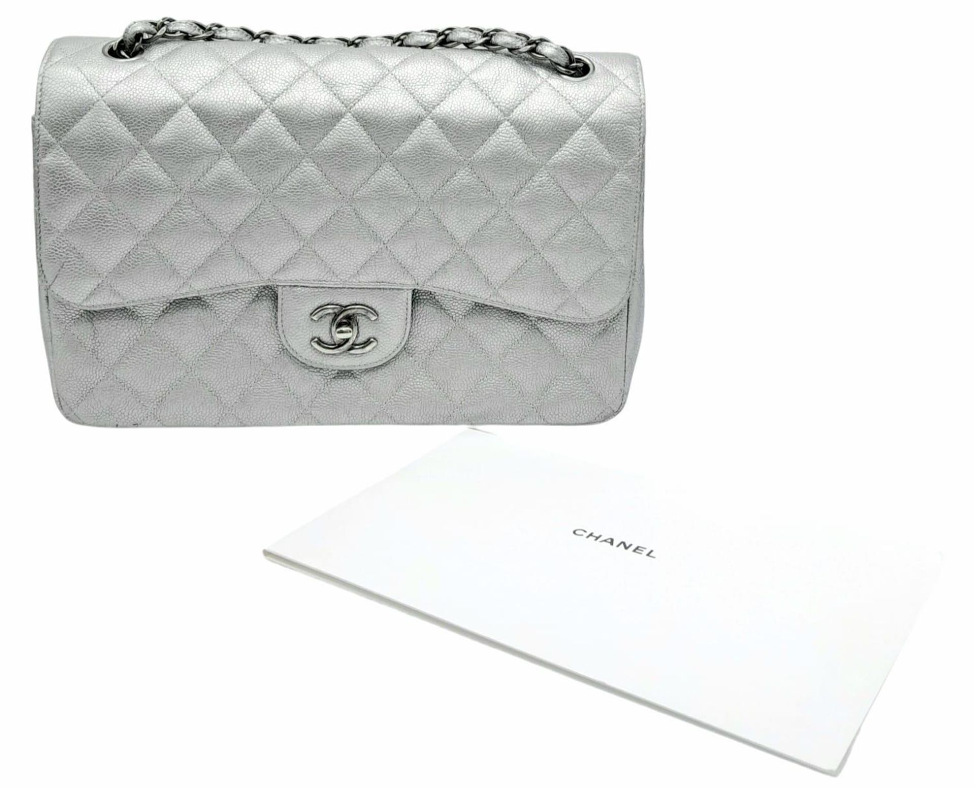 A Chanel Metallic Silver Double Flap Jumbo Bag. Quilted caviar leather. Silver tone hardware. Double - Image 2 of 12