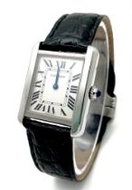 A Very Collectible Cartier 3170 Quartz Ladies Watch. Black leather strap with Cartier clasp.