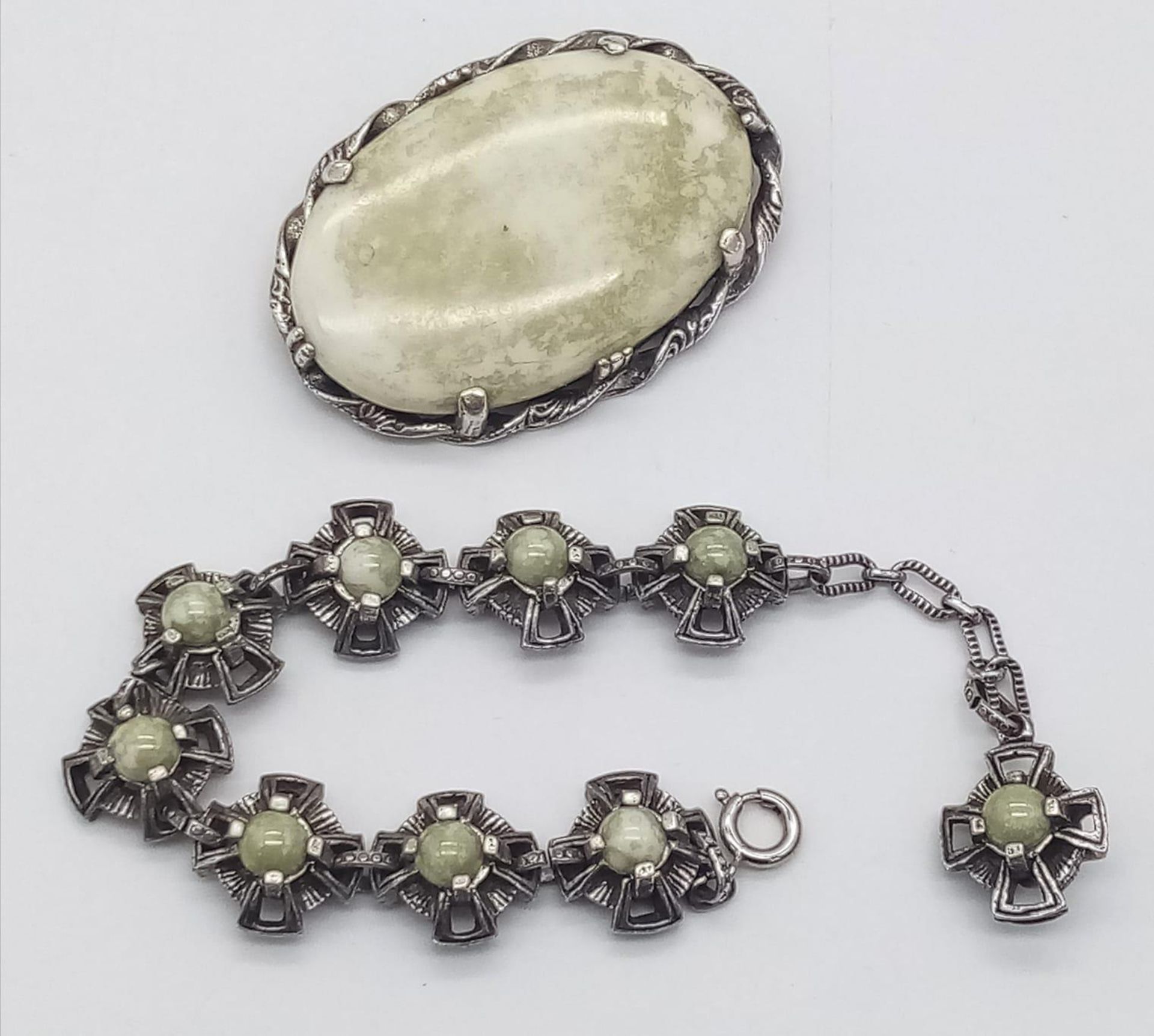 A Large Oval Moss Agate Brooch with a Moss Agate Bracelet.