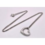 A 9K WHITE GOLD TIFFANY STYLE HEART PENDANT ON 20" CURB CHAIN 4.1G ref: SC 1051