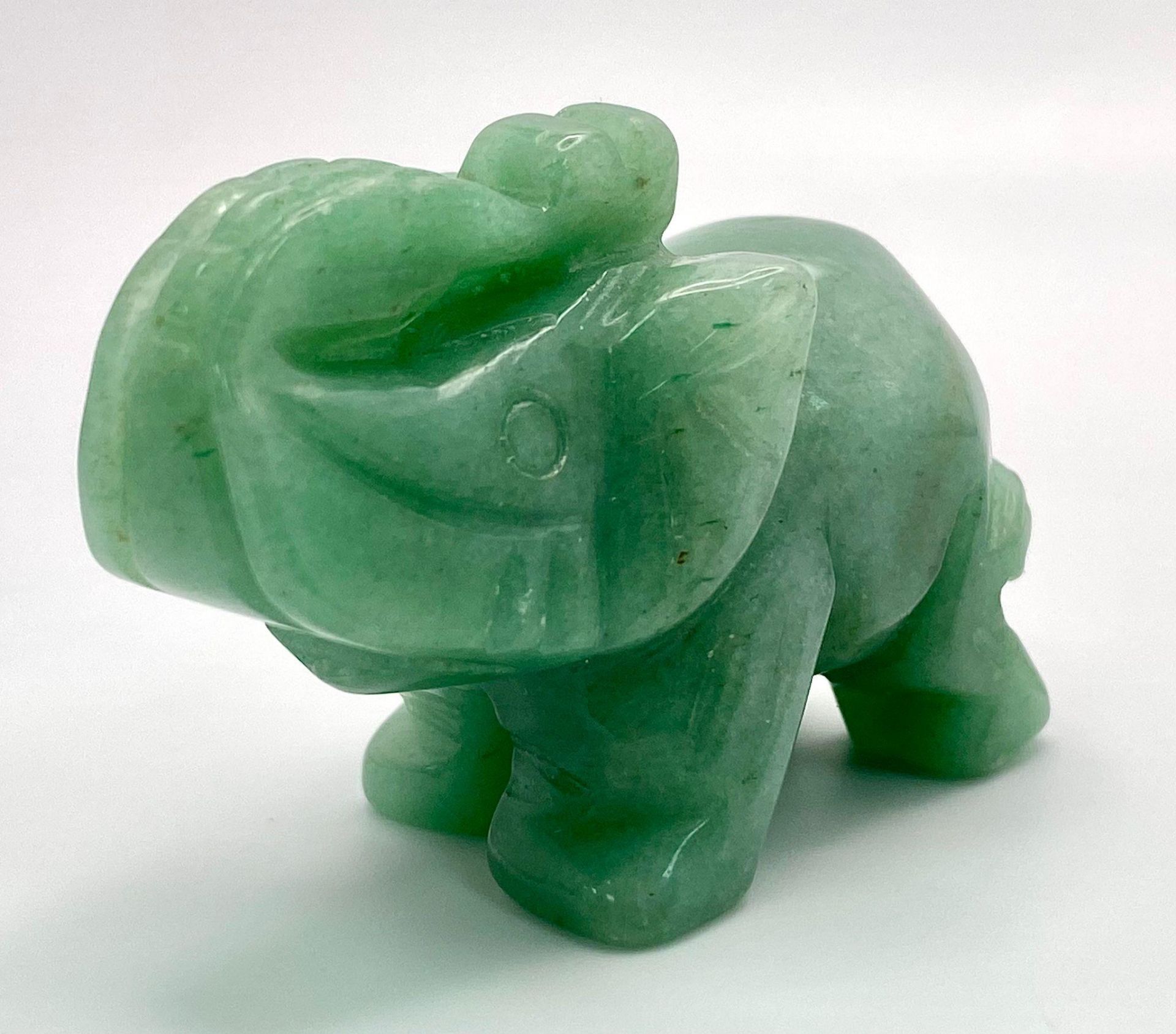A Hand-Carved Green Jade Elephant Figure. 5.5 x 4cm - Image 2 of 4