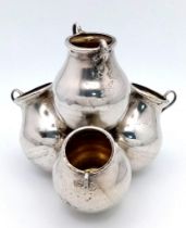 A Vintage Stacked Spice Pot Planter Set - Four Joined Silver Plated Pots. 7cm tall.