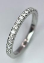 A Platinum Diamond Half-Eternity Ring. Size K. 2.95g total weight. Ref: 15812