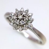 A 9K WHITE GOLD DIAMOND CLUSTER RING IN THE FLORAL DESIGN approx 1.67G SIZE N ref: SC 1019
