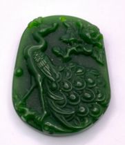 A Chinese Green Jade Decorative Peacock Pendant. 5cm