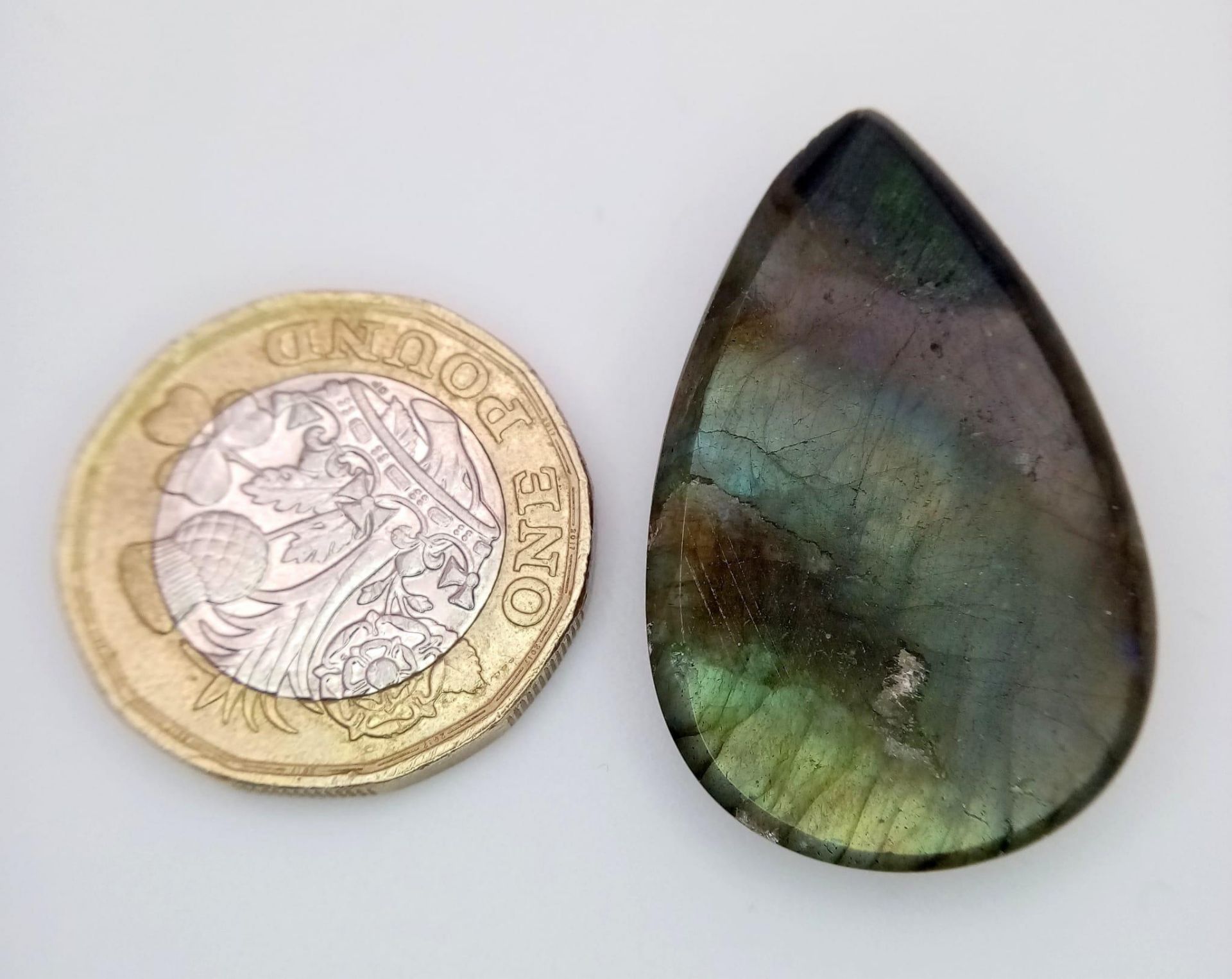 A 34.14ct Untreated Labradorite, in the Pear Cabochon Shape. Comes with the GFCO Swiss Certificate - Bild 5 aus 8