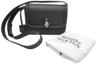 An Alexander McQueen Black Leather Skull Shoulder/Crossbody bag. Textured black leather with